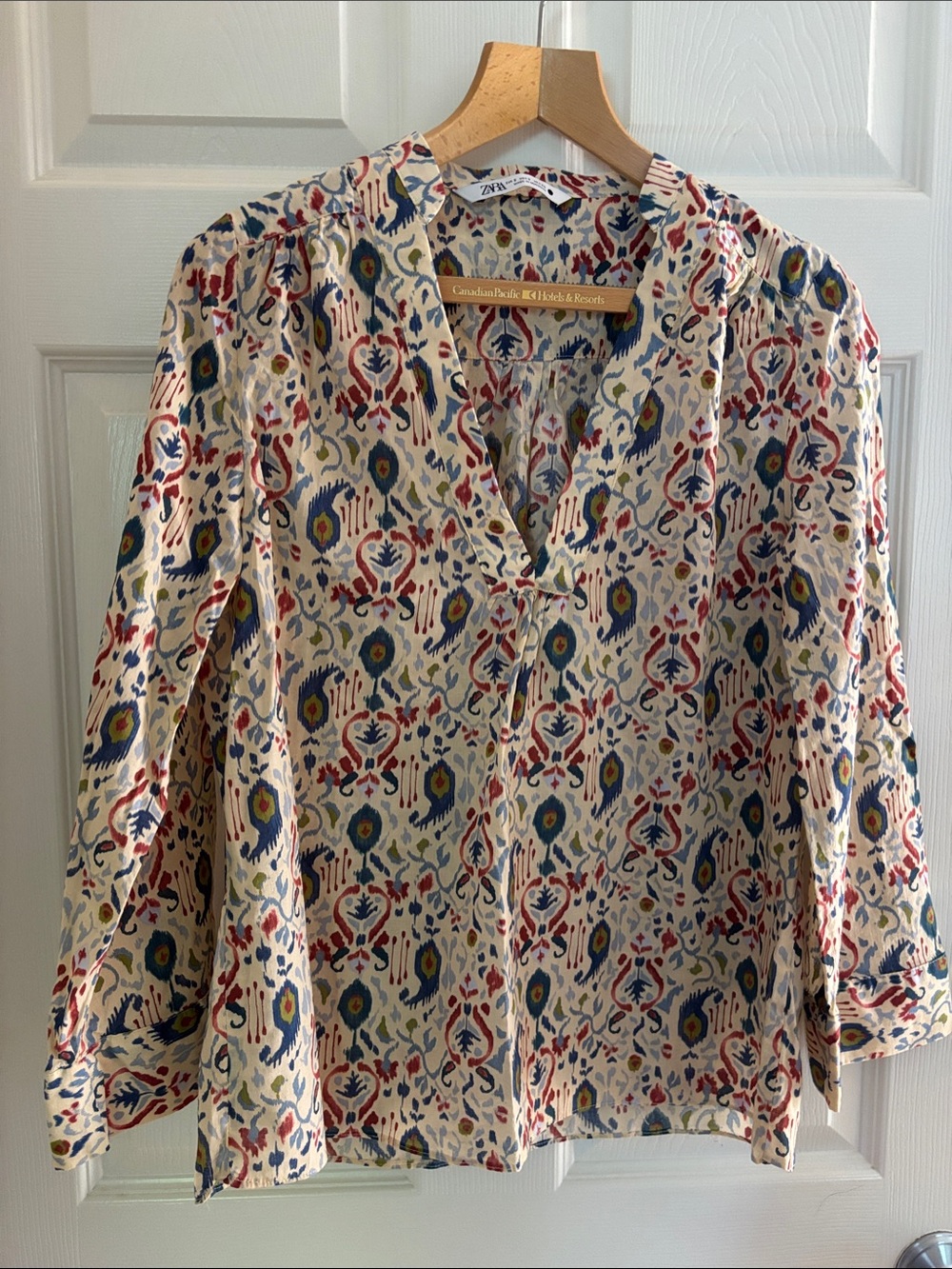 76. Zara Multicolor Ikat-Print V-Neck Long-Sleeve Blouse